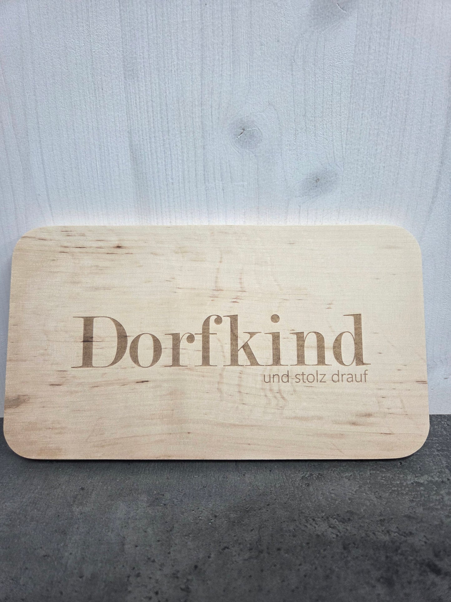 Frühstücksbrettchen "Dorfkind und stolz drauf"